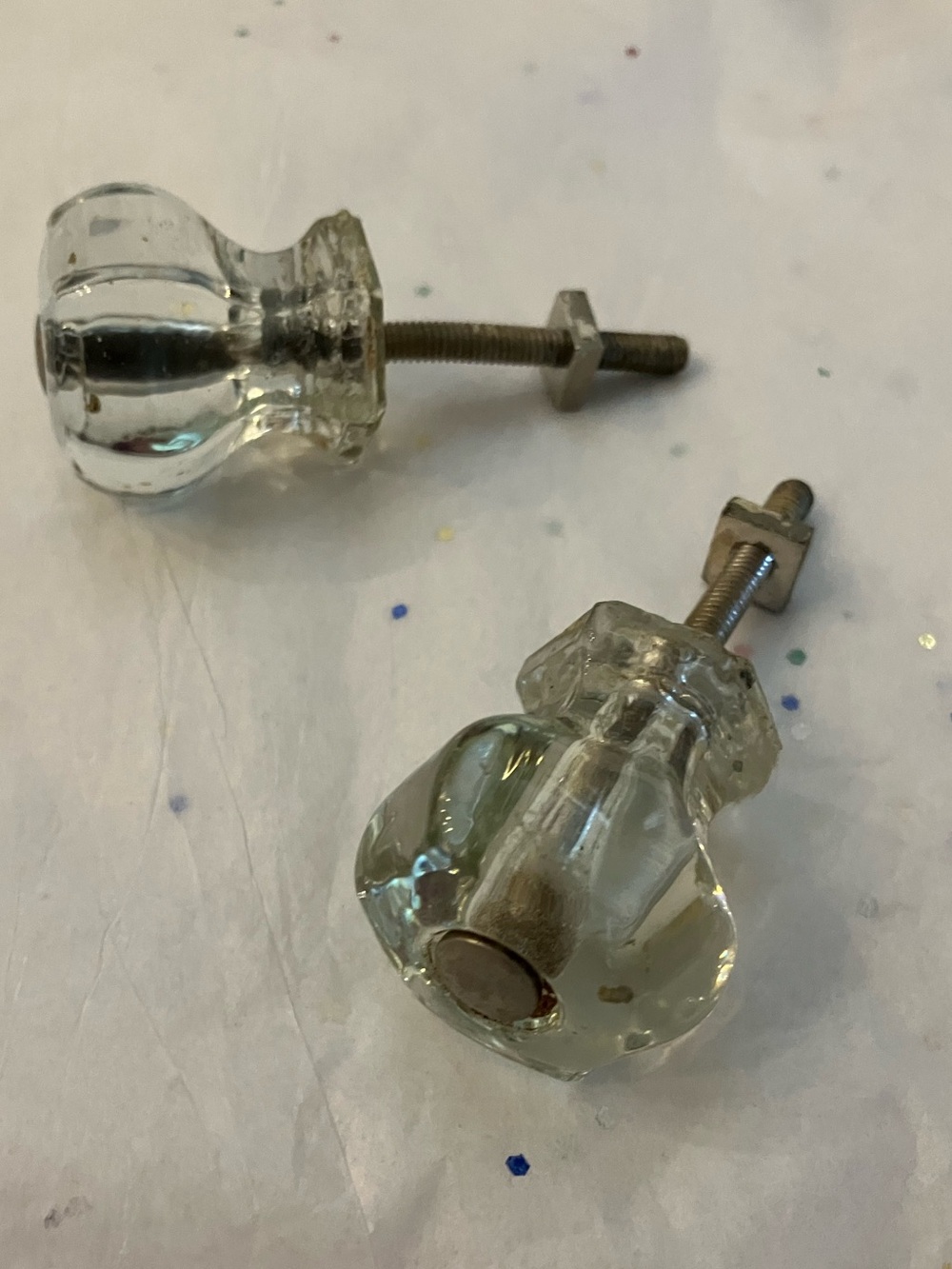 Two vintage clear knobs